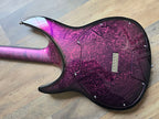Purple and black guitar body on a wooden floor