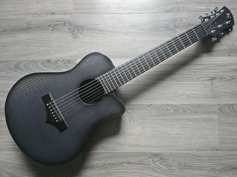 Gray 7-String Acoustic guitar for sale.