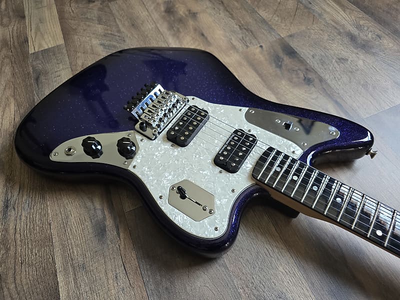 Electric guitar with a blue and white design and Seymour Duncan pickups