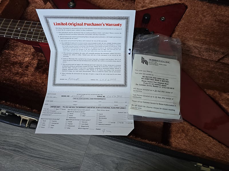 Guitar with warranty paper and brand label
