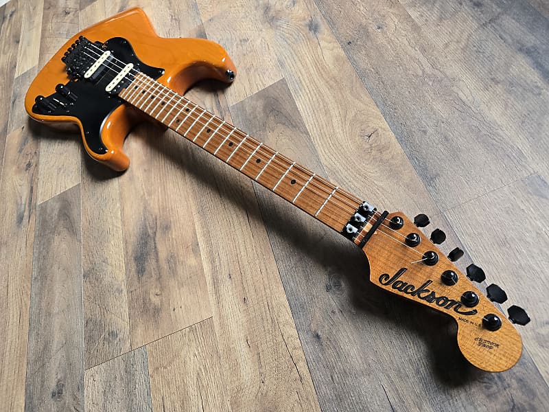 Jackson electric guitar on a wooden floor