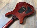Guitar body on a wooden surface