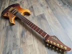 Sunburst color guitar with a cocobolo fretboard and stainless steel frets