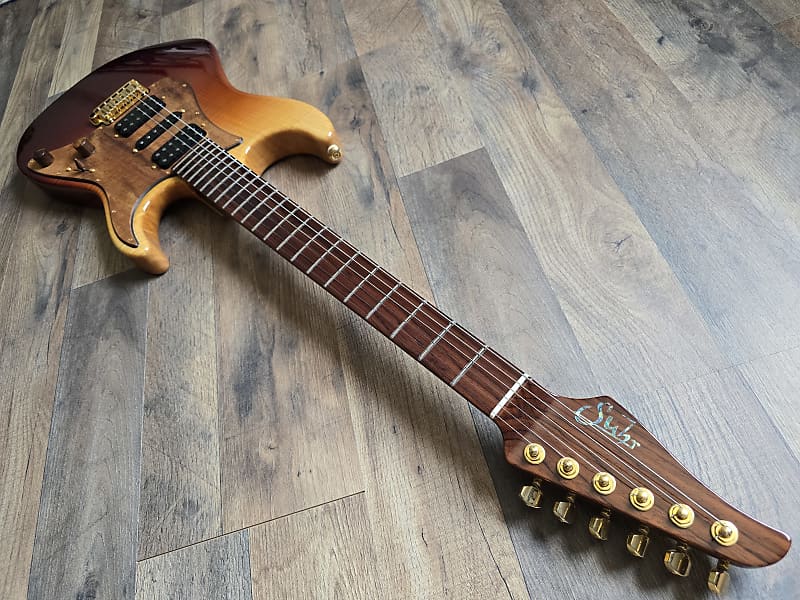 Sunburst color guitar with a cocobolo fretboard and stainless steel frets