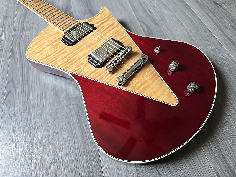 Ernie Ball Music Man Armada.