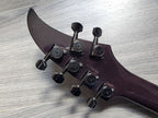 Close-up of a crimson guitar headstock with black tuning pegs and a serial number