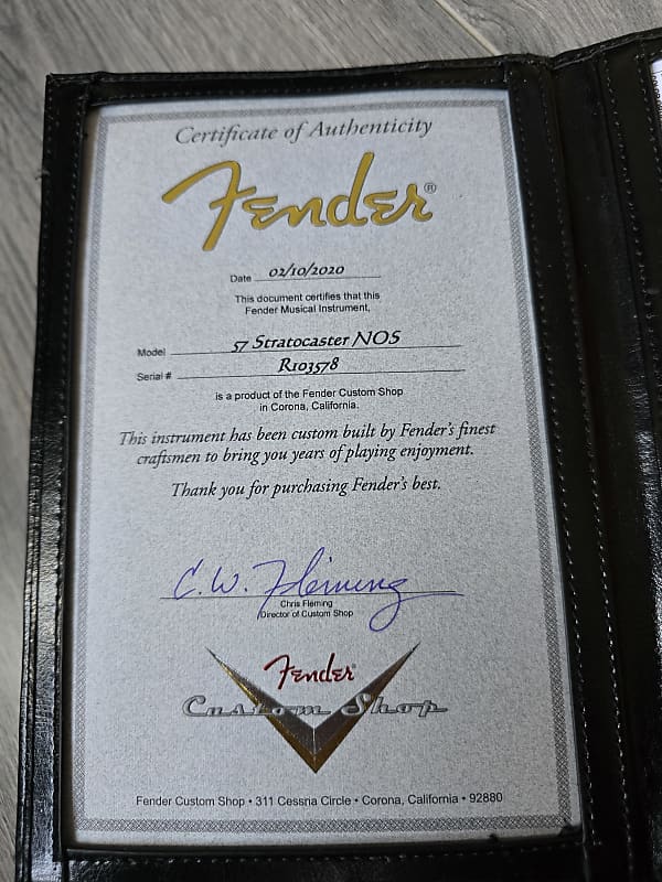 Fender 57 Stratocaster NOS certificate of authenticity in a black leather case