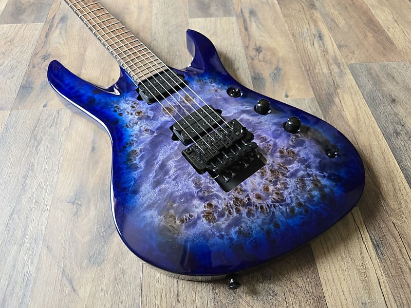 blue Jackson electric guitar showcasing bridge and pickups