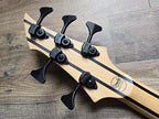 Rear view of Ormsby BassGTR 5 headstock with logo and tuning machines