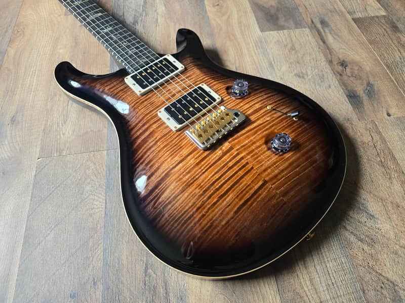 Side angle of PRS Custom 24 highlighting ergonomic body carve