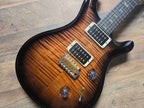 PRS Custom 24 Artist showing carved maple top and double cutaway body
