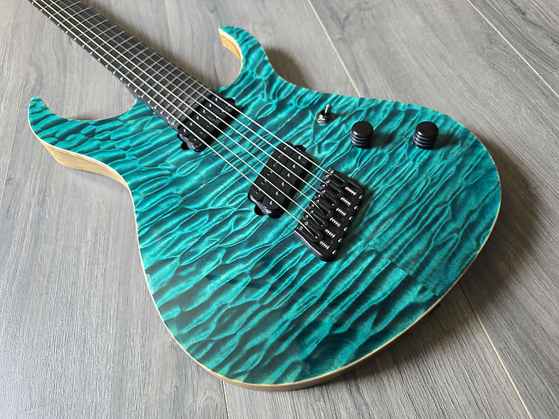 Vandermeij Magistra Multiscale NAMM Showpiece guitar with turqoise body and black pickups