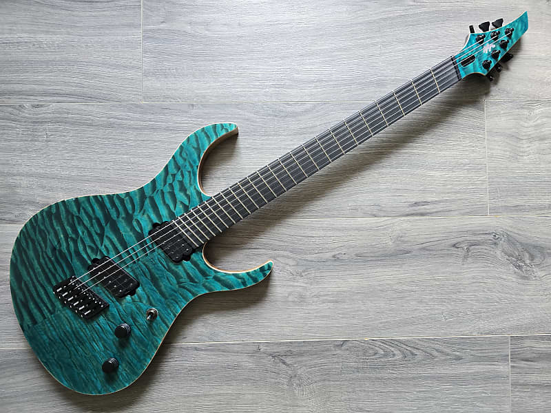 Turquoise electric guitar for sale